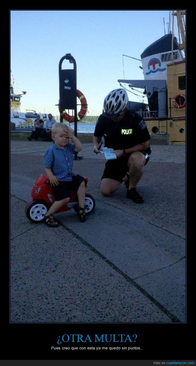 agente,policia,niño,bicicleta,moto,multa,velocidad