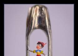 Enlace a Escultura en miniatura