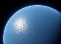 Enlace a Imagina un planeta más grande que la Tierra, sin una sola masa de tierra a la vista. Solo olas y agua desde un polo hasta el otro. Ese es TOI-1452 b
