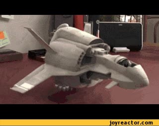 Tu portátil cuando intentas reproducir una canción de Justin Bieber nave espacial,transformer,avion,volar,ventana,laptop,portatil
