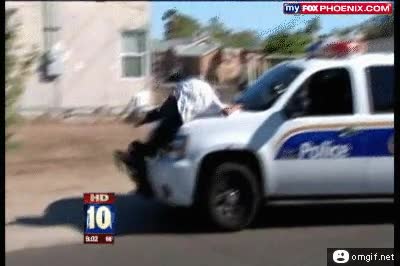 slow motion,coche,saltar,policia,ladron,placaje,detencion,detenido