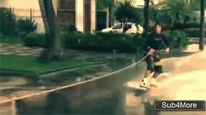 inundacion,charcos,ski acuatico,coche,calle