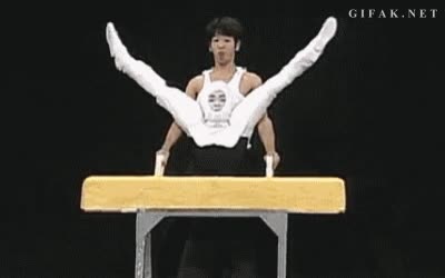 potro con asas,gimnasta,dos hombres,gimnasia,japoneses,teatro negro