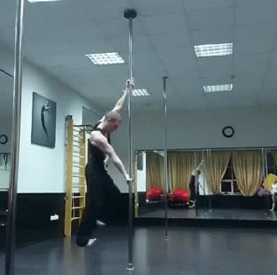 gravedad,pole,chico,acrobata,fuerza incre&iacute;ble