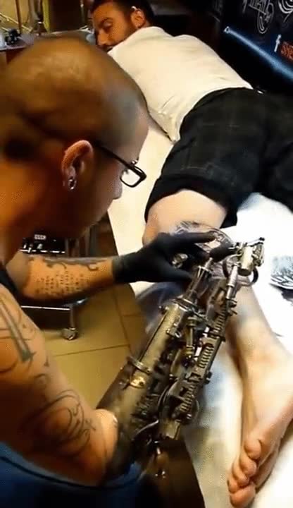 primer,tatuador,brazo,prot&eacute;sico