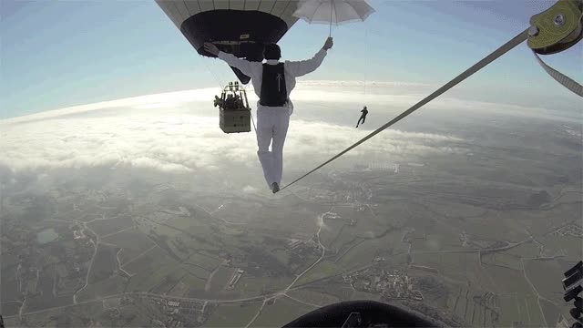 caminar,cuerda flojoa,paraguas,f&aacute;cil,ca&iacute;da