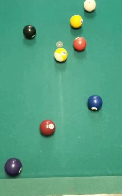 Enlace a Una partida de billar en cámara lenta 