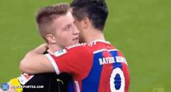 Enlace a GIF: El inexpresivo gesto de Reus al abrazo de Lewandowski