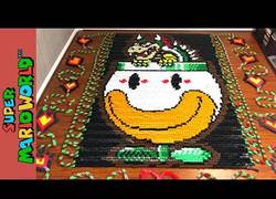 Enlace a Jugando a Super Mario World con 81.032 piezas de dominó