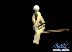 Enlace a Pequeño muñeco de espuma baila al ritmo de la música