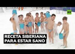 Enlace a Niños en Siberia se echan agua helada por encima a -25 ºC