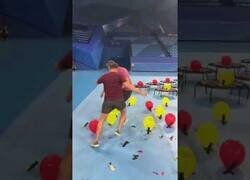 Enlace a La carrera en la que dardos y globos se fusionan