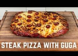 Enlace a Haciendo una pizza pero la masa es un filete