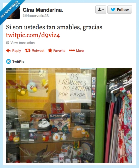 escaparate,cartel,no entrar,por favor,todo a cien,chino,ladrones