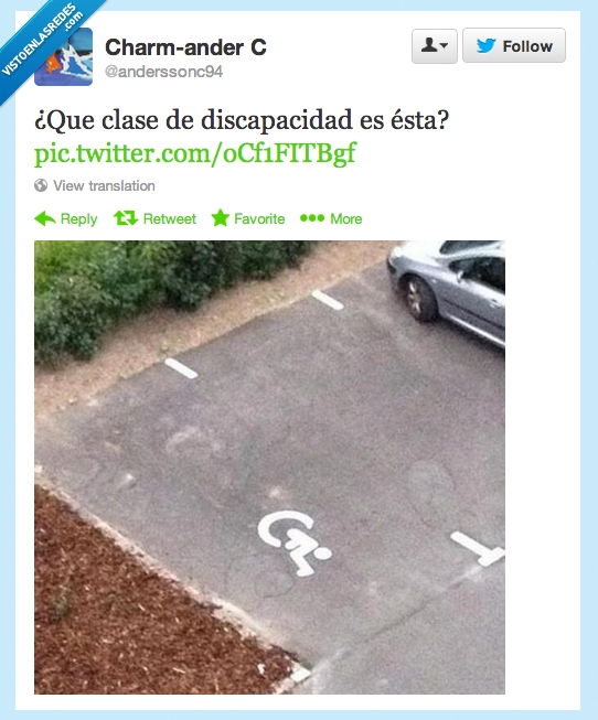 pintado,mal,reves,minusvalido,muñeco,parking,plaza,discapacidad,aparcamiento,silla de ruedas