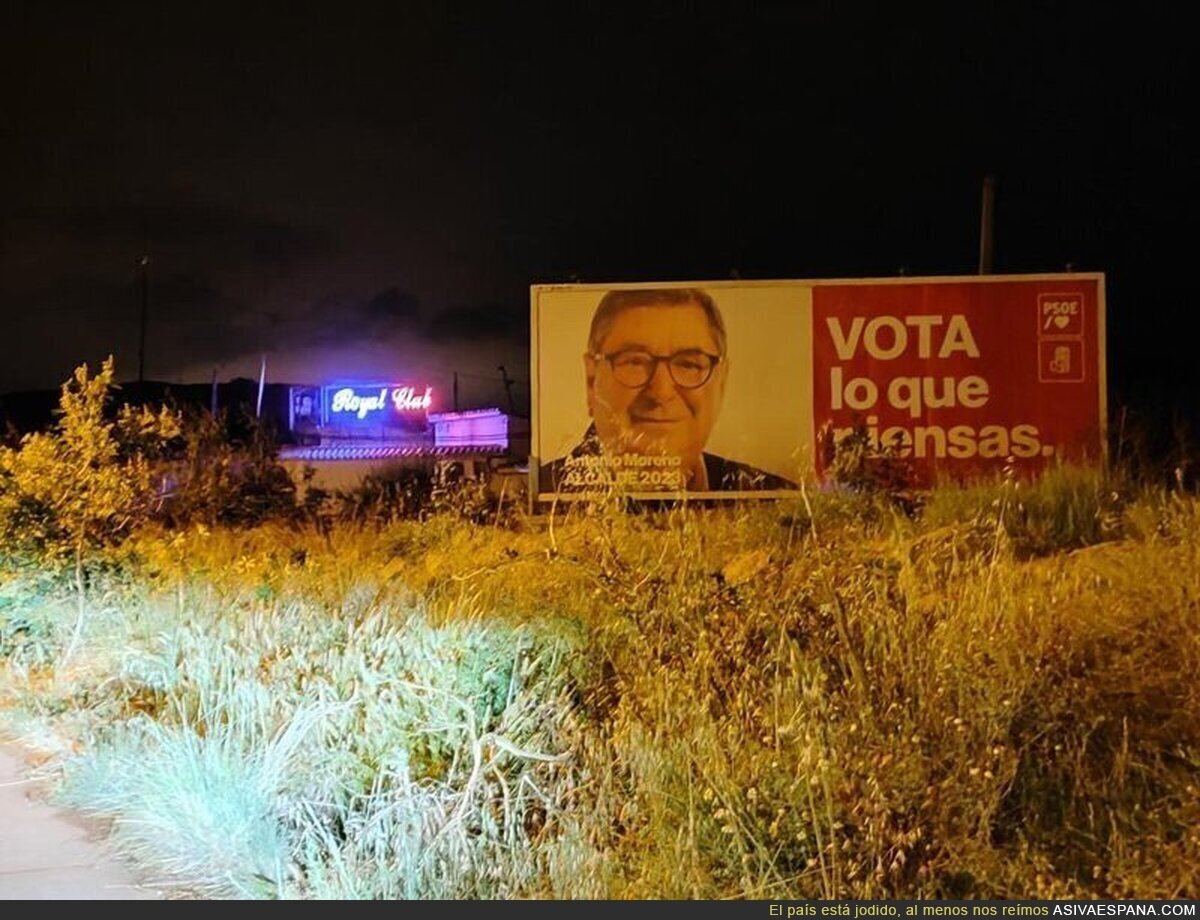 Cartel del PSOE en Torre del Mar, Málaga, delante de un club de alterne, por @wallstwolverine