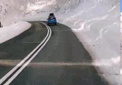 Enlace a Me encantaría conducir por esta carretera llena de nieve