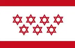 La nueva bandera de la Comunidad de Madrid ya viene con la pol&iacute;tica exterior incorporada
